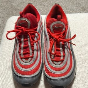 Nike Red and Gray Athletic Shoes with Wave Design
